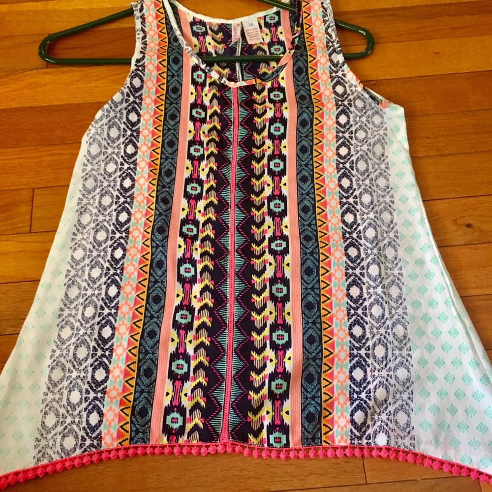 Asymmetrical tank with bright color and fun print